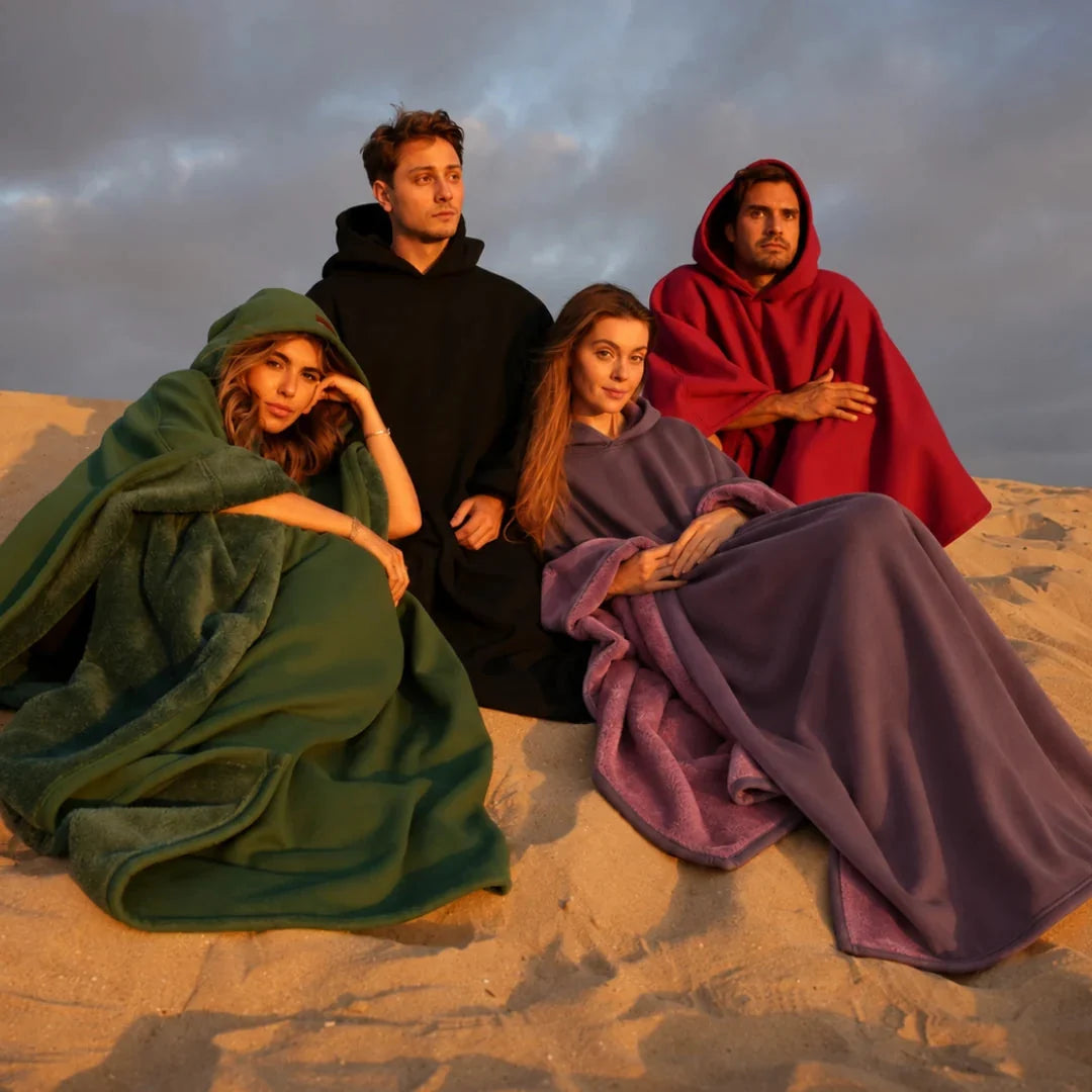 Friends wearing green, red, purple, and black Eden Hoodies outdoors