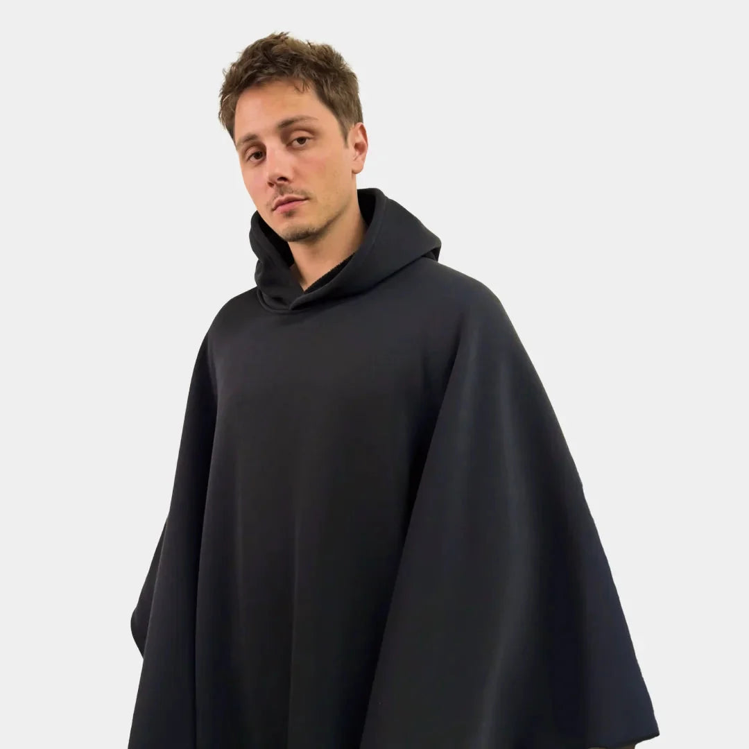 Justin Tubis wearing a black Eden Hoodie